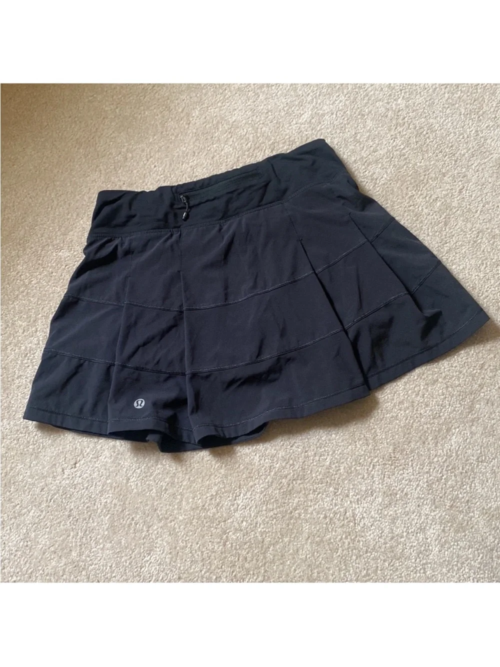 Lululemon black Athletic skirt with built-in biker shorts. Size 4
